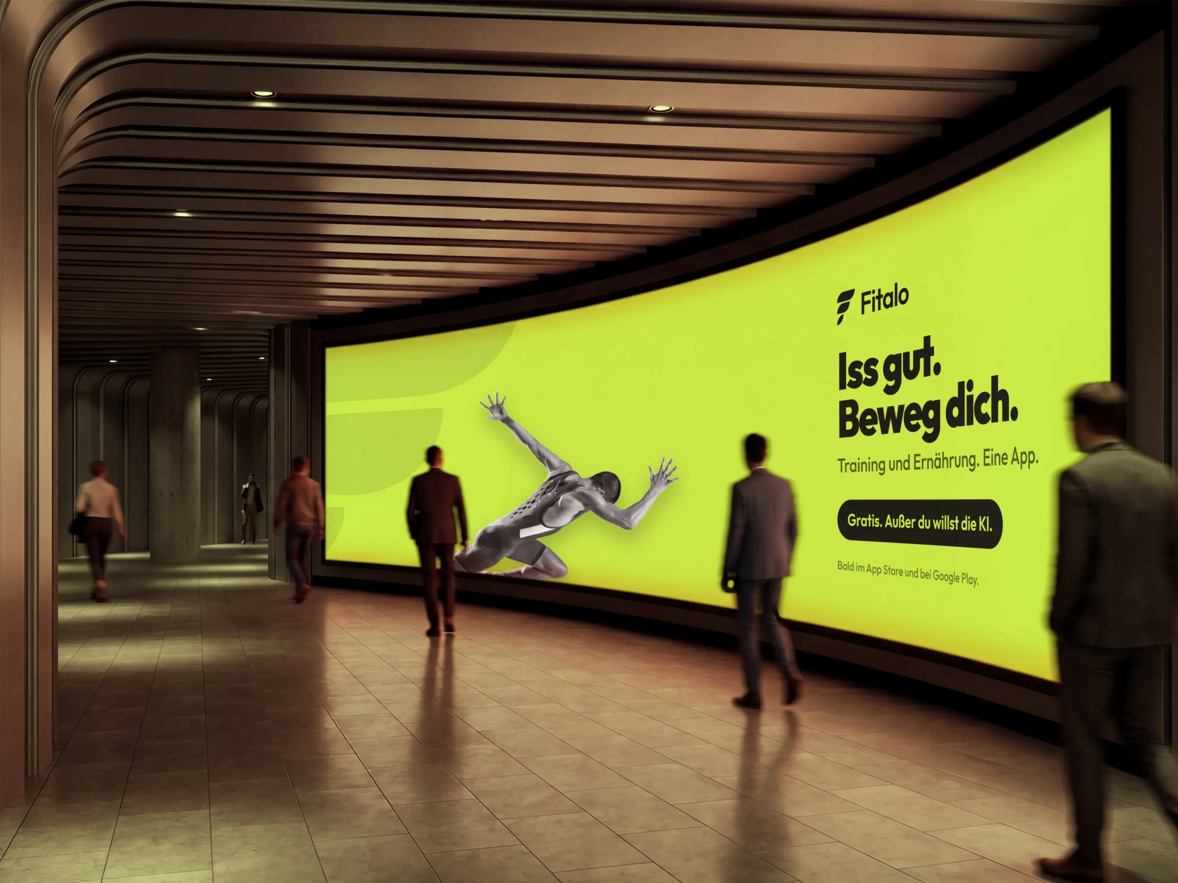 Digitale Werbewand in einer U-Bahn-Passage mit der Fitalo-Kampagne